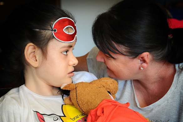 An older photo of Georgie Bennett and her daughter Holly, who has Phelan McDermid Syndrome.