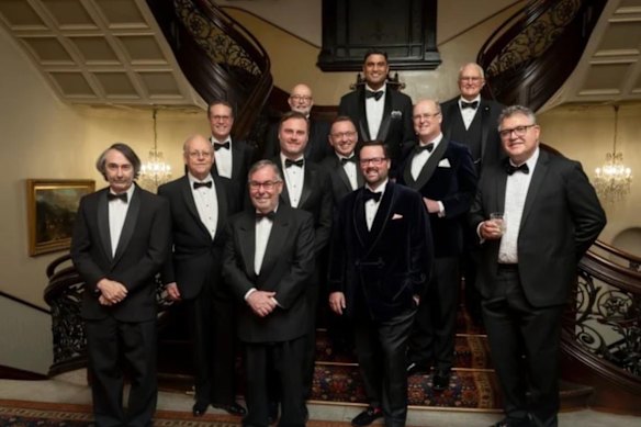 Nicholas Smedley (front row, fourth from left, with beard, wearing glasses and a velvet jacket) at The Australian Club following his appointment as the chair of the house committee last month.