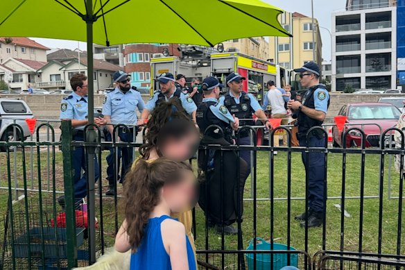Police stand guard at Chanukah By The Sea in 2023.