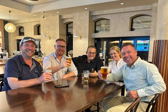 Former Hinchinbrook MP Nick Dametto (far right) thanked Townsville after early results showed he would achieve victory.