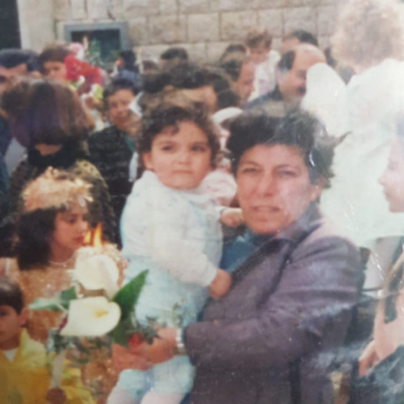  Fadi as a baby with his mother, Hiam Chalouhy, at a Palm Sunday celebration in Lebanon. His father, who left them a year after Fadi was born, never registered his birth.