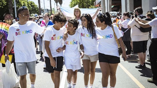 George, centre, and father Costas, brother Peter, sister Elle and mother Roslyn, with the Kind is Cool clothing group in Pride March.