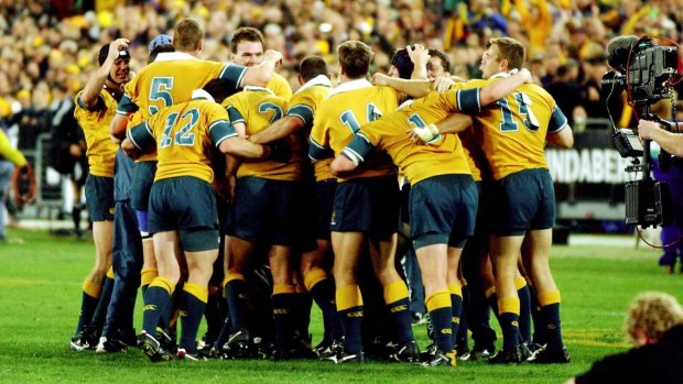 Long time between drinks: The Wallabies huddle together after that 2002 triumph.