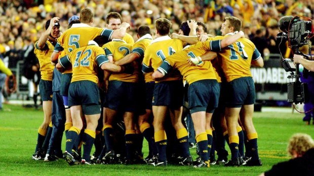 Long time between drinks: The Wallabies huddle together after that 2002 triumph.