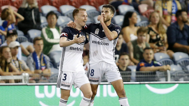 Terry Antonis (right) celebrates after scoring the winning goal against the Jets.