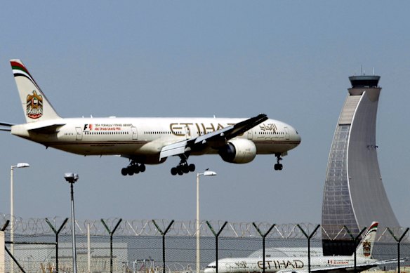 An Etihad Airways plane prepares to land at the Abu Dhabi airport in the United Arab Emirates.