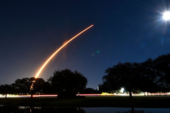 A SpaceX rocket launches Starlink satellites. Starlink remains SpaceX’s profit engine.