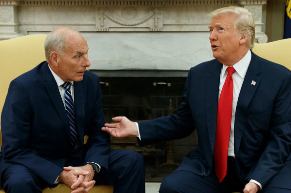 John Kelly served as Donald Trump’s chief of staff. They are pictured in the White House in 2018.