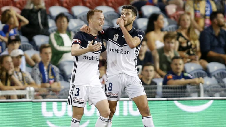 Terry Antonis (right) celebrates after scoring the winning goal against the Jets.