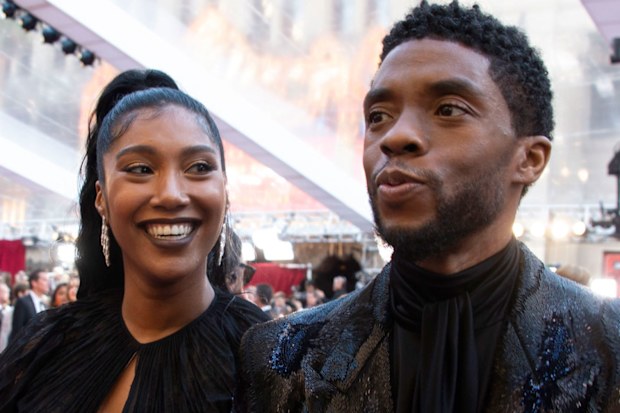 Taylor Simone Ledward gives an emotional tribute to her late husband Chadwick Boseman at the Gotham Awards. Seen here, the couple attends the 91st Oscars on February 24, 2019, in Hollywood, California.