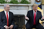 US President Donald J. Trump (R) and Prime Minister of Israel Benjamin Netanyahu (L) deliver remarks to members of the news media during their meeting in the Oval Office of the White House in Washington.