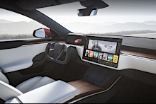 The new interior of the Model S includes a rectangular steering wheel with no stalks and a 17-inch high-definition screen in the centre console.