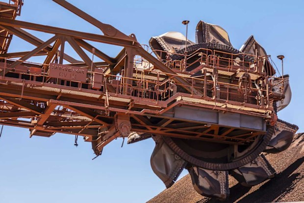 A reclaimer at the ore stockpile at the BHP Jimblebar facility in the Pilbara region of Western Australia.