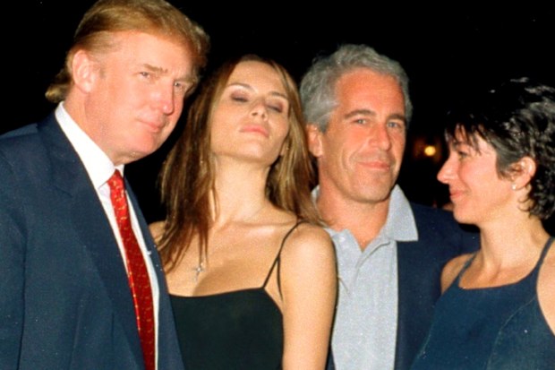 Donald Trump and his girlfriend (and future wife), former model Melania Knauss, financier Jeffrey Epstein, and British socialite Ghislaine Maxwell pose together at the Mar-a-Lago club, Palm Beach, Florida, February 12, 2000.