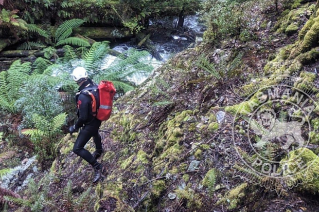 Specialist police search and rescue personnel conducted a swift water search at Philosopher Falls, Waratah in a bid to locate missing woman Celine Cremer.