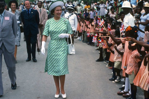 Queen Elizabeth ll is greeted by the public during a walkabout in Barbados in 1977.