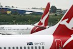 Qantas planes on the tarmac at Sydney Airport.