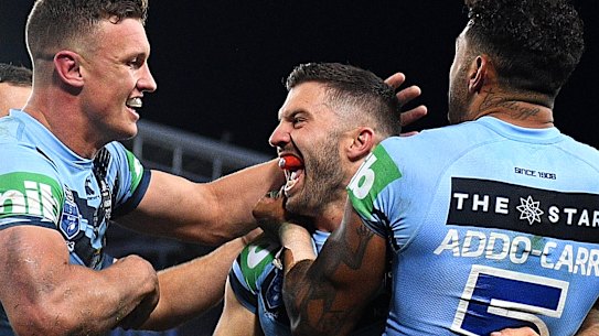Big Ted: James Tedesco and the Blues celebrate a stunning victory.