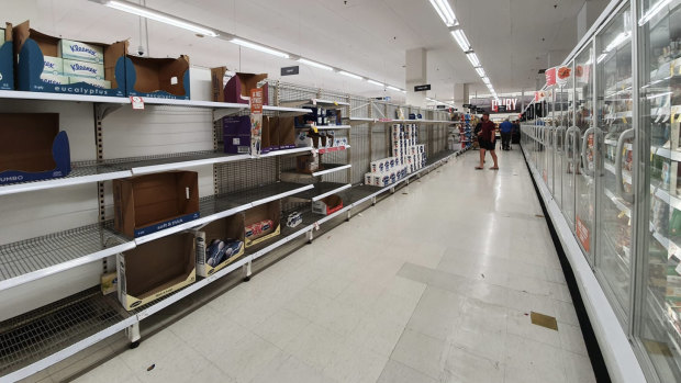 Empty shelves at Port Melbourne Coles once contained toilet paper. 