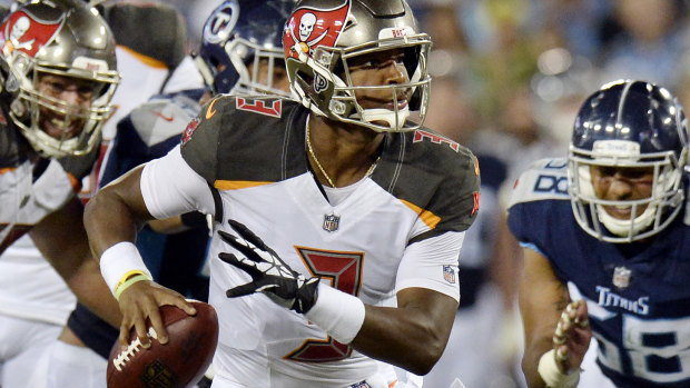 United: Tampa Bay Buccaneers quarterback Jameis Winston looks for a receiver.