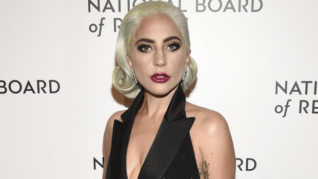 Lady Gaga has said sorry for her 2013 duet with singer R. Kelly.