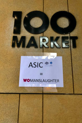 Anthony Koletti attached this sign outside ASIC’s office on the anniversary of his wife Melissa Caddick’s disappearance. 
