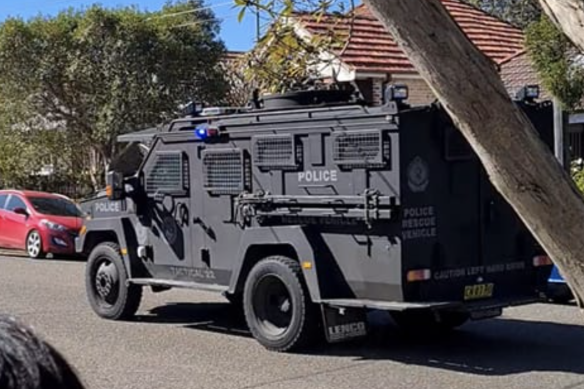 The police operation on Denison Road, Dulwich Hill.