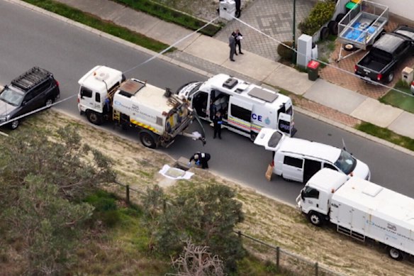 Police at the scene where a baby’s body was found in Alexander Heights on Monday.