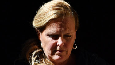 Witness Tracey Valle leaves the Supreme Court on Tuesday. 