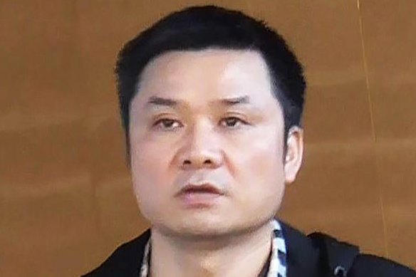Binjun Xie, who was convicted of charges in Britain but entered Australia and is now linked to organised crime.