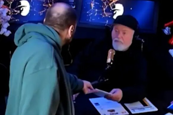 Kyle Sandilands was served with subpoena papers live on air by his manager, Bruno Bouchet.