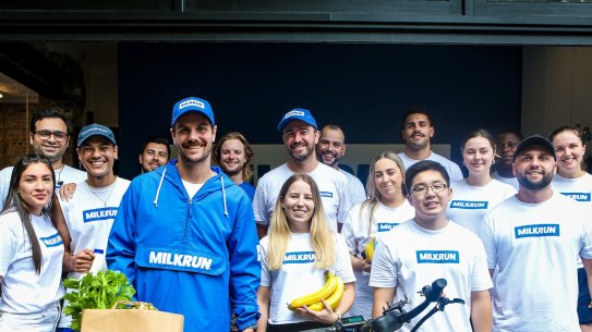 Milkrun founder Dany Milham (in blue jacket) faces having to run his business in tougher times.