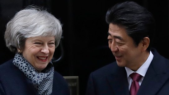 Theresa May welcomes Shinzo Abe to Downing Street.