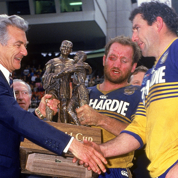 Australian Prime Minister Bob Hawke congratulates Mick Cronin (right) and Ray Price after their 1986 NSWRL grand final win.