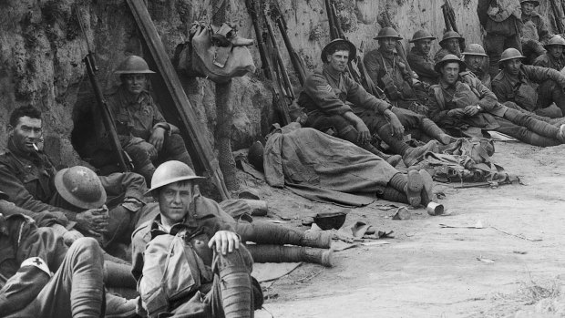 Men of C Company, 1st Battalion, wait to go “over the top” for the second time in hours on August 23, 1918. Sgt Harold Andrews, his stripes visible, sits at centre right.