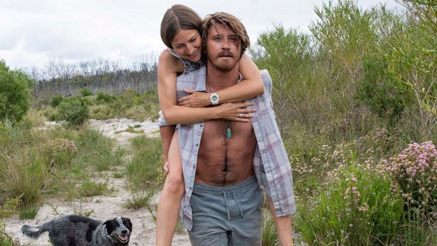Lu (Garrett Hedlund) and Georgie enjoy a rare carefree moment in Dirt Music.