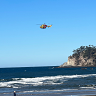 Woman dies after multiple swimmers pulled from water on NSW South Coast