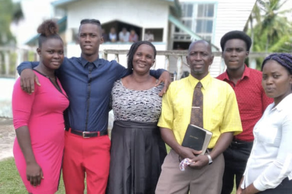 Shamar Joseph (second from left) with family members in Baracara.