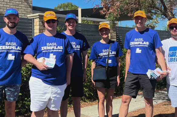 Basil Zempilas posted this image of Cam Sinclair (far left) and other doorknockers on his Facebook page on Sunday.