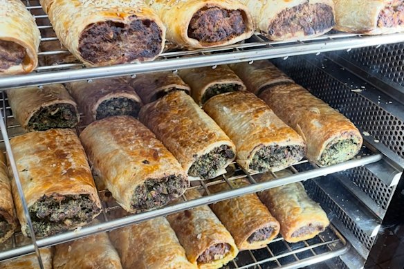 Homemade sausage rolls are available in the cabinet.
