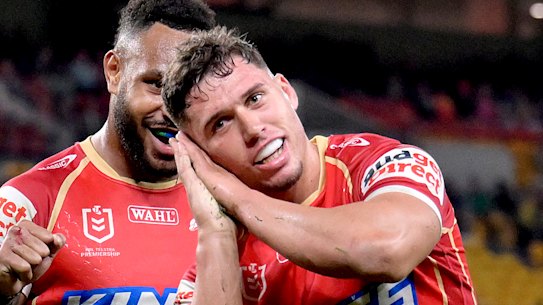 Jake Averillo of the Dolphins celebrates after scoring a try.