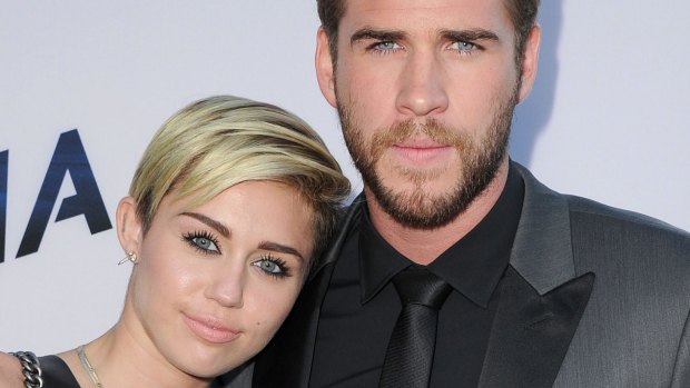 Miley Cyrus and Liam Hemsworth in 2013.