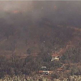 An out-of-control blaze at Millmerran is threatening homes 