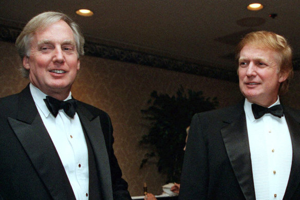 Robert Trump (left) in 1999 with then real estate developer and presidential hopeful Donald Trump at an event in New York. 