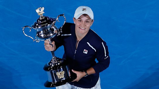 Ash Barty poses with the Daphne Akhurst Memorial Cup.