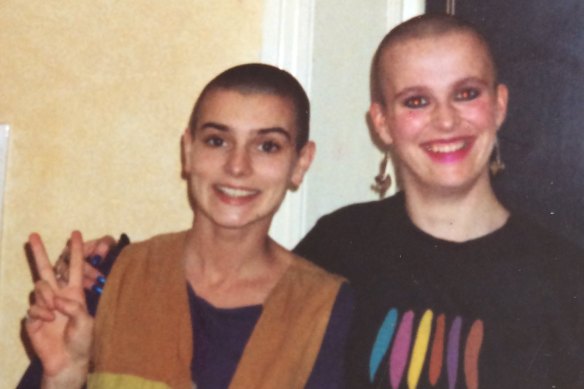Sinead O’Connor with English fan Louise Woodcock, getting her head shaved following chemotherapy.