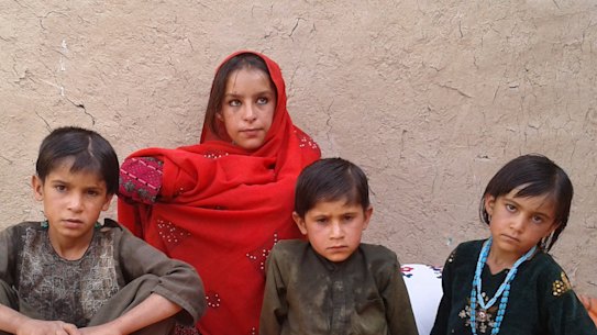 Some of the children of deceased Afghan villager, Ali Jan. Ben Roberts-Smith has been arrested over allegedly kicking him off a cliff, then ordering his killing.