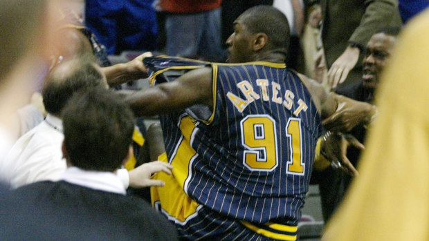Artest clashes with fans.