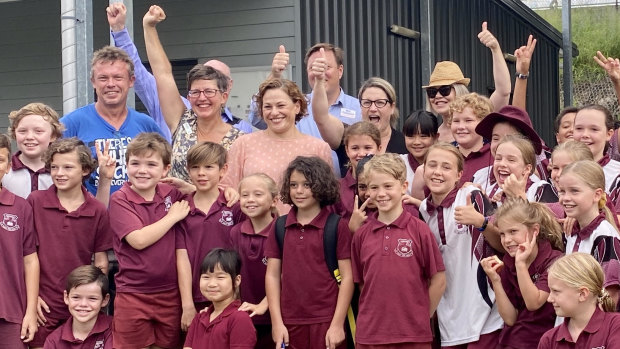 Buranda State School students, teachers, parents, Greens candidate Sally Dillon and South Brisbane MP Jackie Trad celebrate the decision on Thursday.