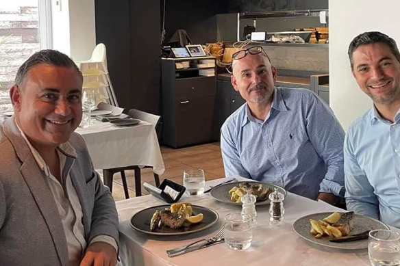 This photo was up for just one day on Liverpool Mayor Ned Mannoun’s Facebook page.
It shows the newly appointed Coronation executive director John Barilaro, with Liverpool Council CEO Peter Diplas (centre) and Liverpool Mayor Ned Mannoun (right).